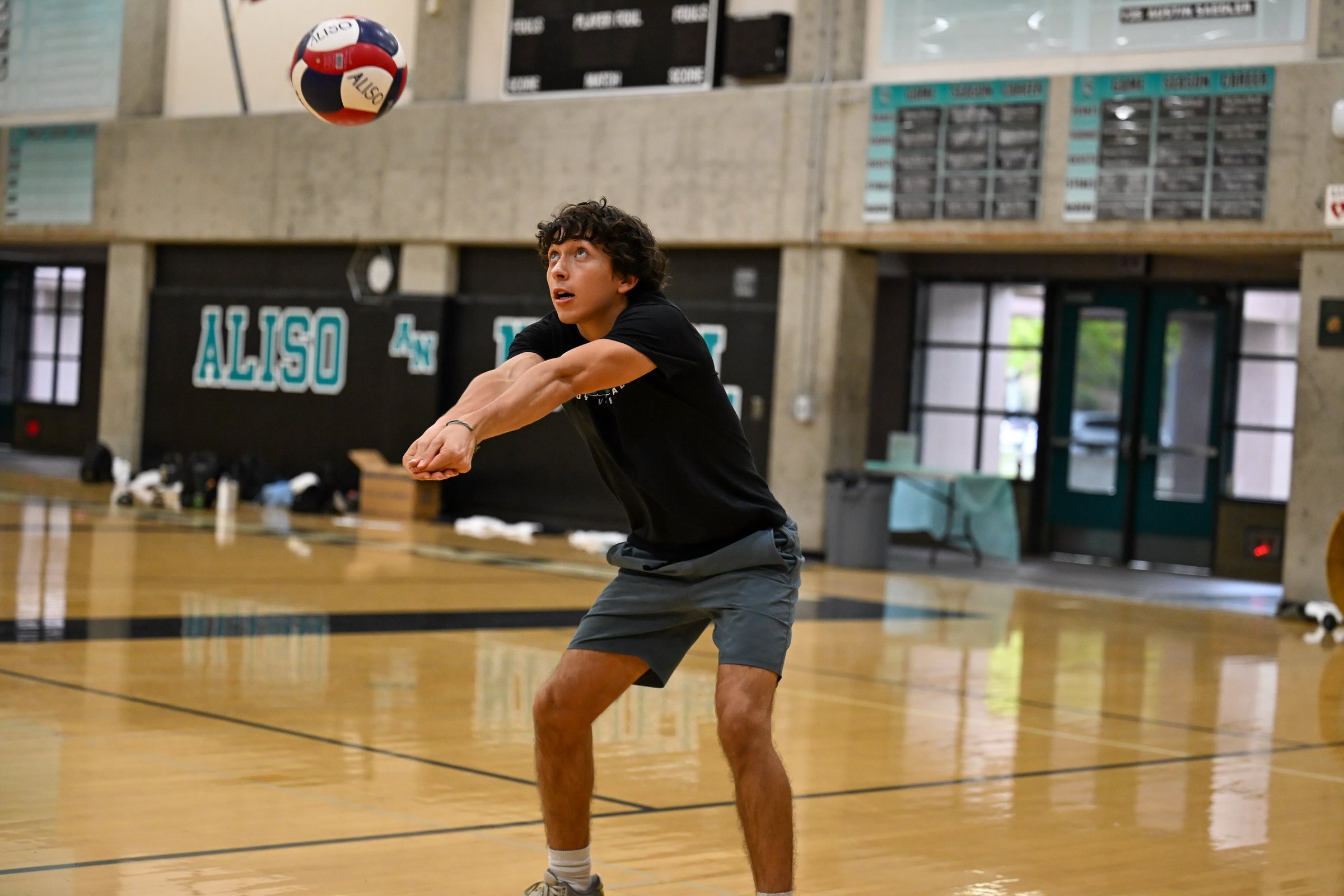 A player passes a ball in the ANHS gym